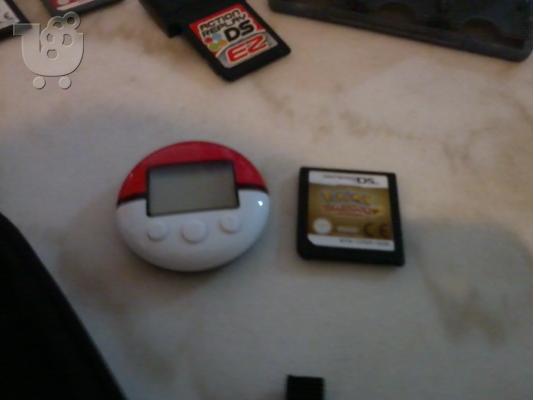 Nintendo Dsi with:Case,3 action replay,16 cards,6 card case in 150 EURW FREEEE